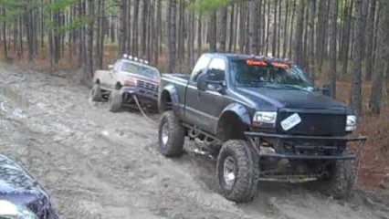 7.3 Diesel Gets Stuck And Pulled Out By One NASTY V10 Powered F350
