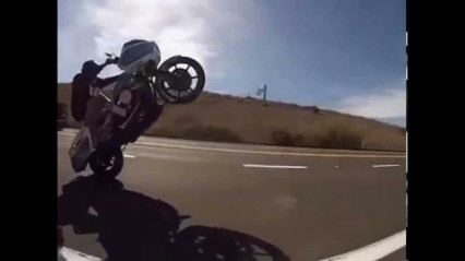 CRAZY Guy On Harley Does Full Vertical Wheelies!