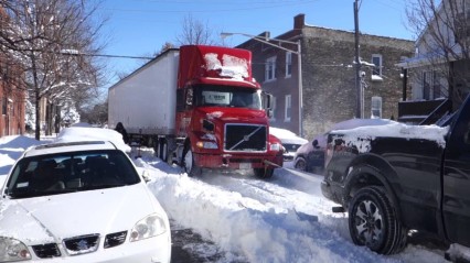 Ford F150 FX4 Tows Semi Truck During Chicago Blizzard