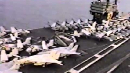 FUNNY – Helicopter Drops Off Greased Pigs on the USS Saratoga Aircraft Carrier