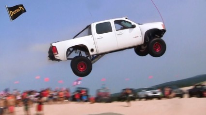 GMC Truck Goes HUGE In The Dunes! MASSIVE JUMP!