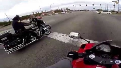 Guy On Sport Bike Races A Cop – Cop gets Fired!