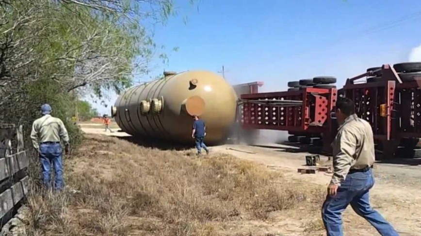 HUGE HAUL TRAILER Loaded With Large Gas Tank ROLLS OVER!