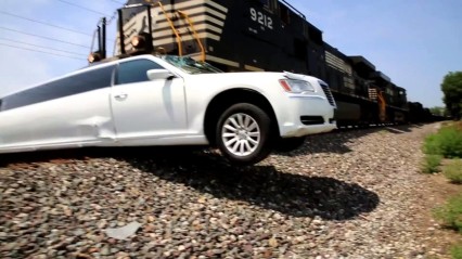 INSANE – Limo Gets Stuck on Train Tracks, Train Does NOT Stop!