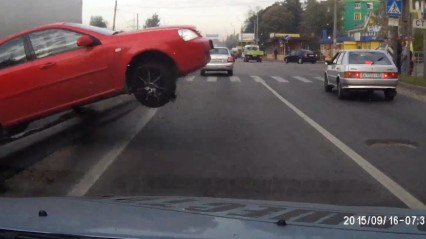 Instant Karma? Car Cuts Off Truck and Goes Airborne Into Oncoming Lane!