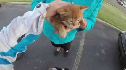 Lady On Motorcycle Saves a Kitten in The Middle Of an Intersection