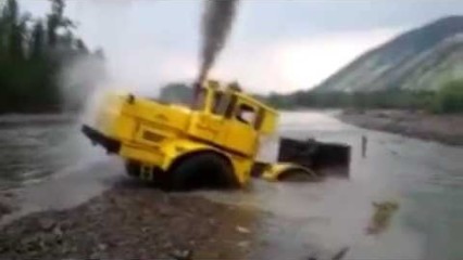 NEVER GIVE UP – Tractor Gets Stuck In A River
