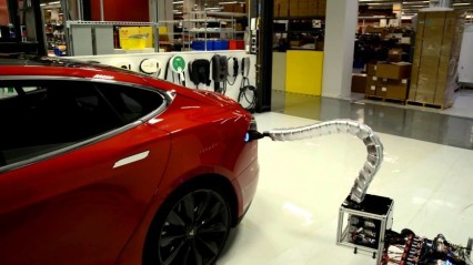 New Tesla Charger Plugs Itself in – Is this the Future of Robotics?