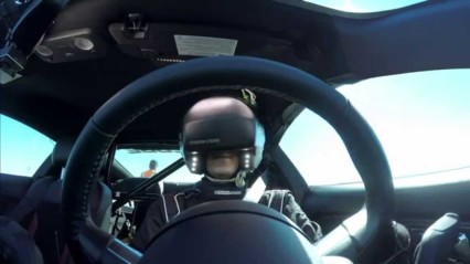 Racing a Real Car While Blinded by a Virtual Reality Helmet