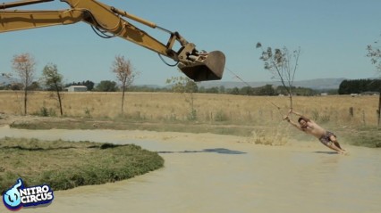 Redneck Wake Boarding With An Excavator Is INCREDIBLE!