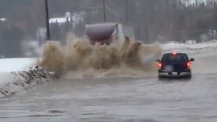 Semi Truck vs Flood – No Slowing This Guy Down!