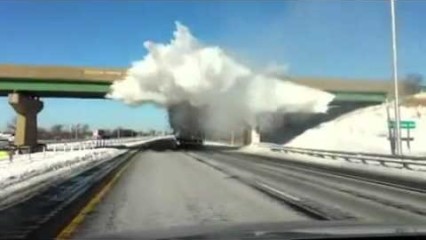 Snow Explodes as Truck Passes Under Bridge!