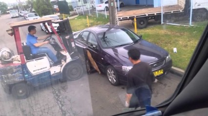 Workers Move Illegally Parked Car With A Forklift!