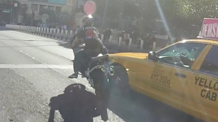 Bike has Close Call with TAXI Cab on the Las Vegas Strip