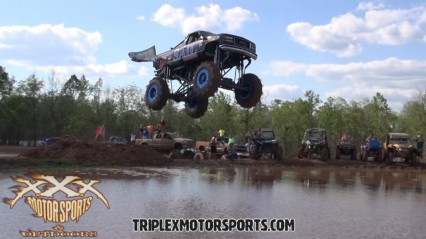 HUGE Chevy Truck Leaps into the Mud Hole with Style! HUGE AIR!