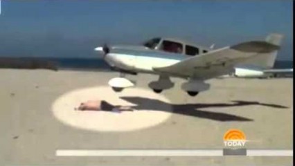 Landing Plane Nearly Hits German Man Sunbathing on Beach