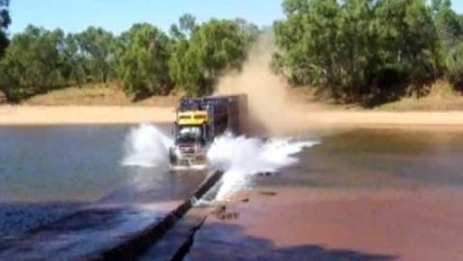 Road Train going flat-out over a river crossing
