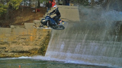 INSANE Snowmobile Dam Jump!