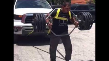 BEAST MODE – Man Pulls Truck While Lifting 415lbs