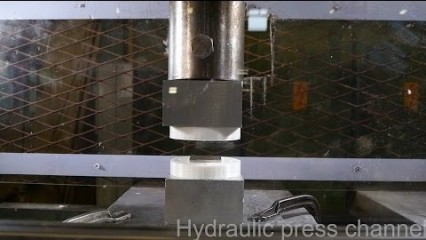 Pressing Two Repelling Neodymium Magnets Together With a Hydraulic Press