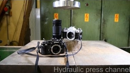 Crushing Old Cameras with a Hydraulic Press