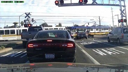 Dodge Truck Ignores Railroad Crossing Signals and Pays the Price
