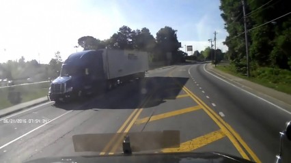 Don’t EVER Try To Merge This Close To a Dump Truck
