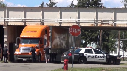 Get Your Truck Stuck? “No, I Was Delivering This Overpass and Ran Out Of Gas!”