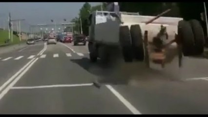 Wheels and Rear End Fly Off a Dump Truck