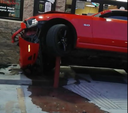 Girl In a Mustang 5.0 Crashes Into Gas Station – Starting a String Of Arguing Women