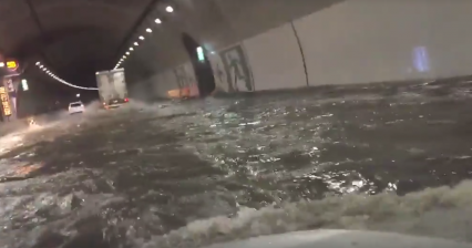 True dedication to get to work, Be glad you don’t take Toyko’s flooded tunnel to work
