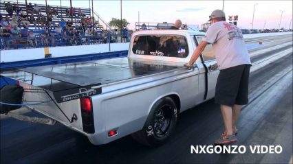 This Driver Has Big Ones – “The Luv” Truck Pulls a Giant Wheel Stand