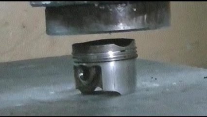 Crushing an aluminum piston with a hydrualic press is extremely satifying to watch