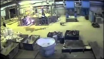 Industrial furnace explosion showers workers with molten metal