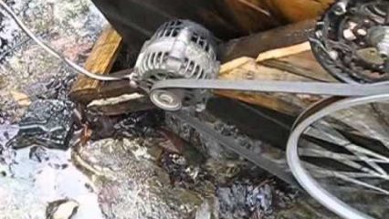 Man from Kentucky powers his house using an alternator and a water wheel