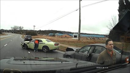 Man in car fails to yield turning left, crashes into Dodge Challenger