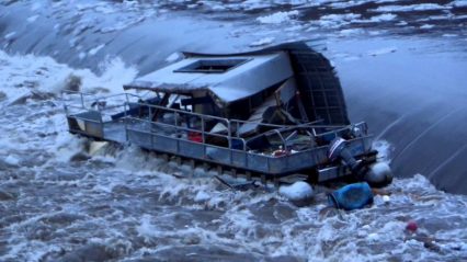 Pontoon boat goes over the dam and gets completely annihilated