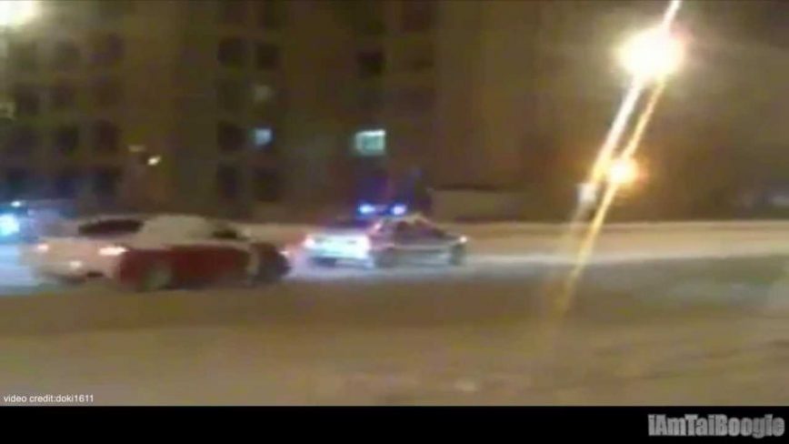 Evo drifting circles around helpeless cop, AWD comes in handy sometimes!