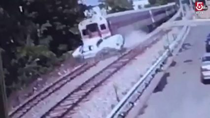 Ford F-150 gets hit hard by a massive train, driver survives