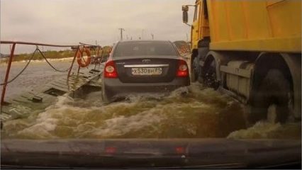 Mean truck driver causes bridge to sink and cars to float