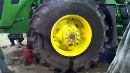 Redneck tire mounting – Using starting fluid to seat the bead on a huge Michelin 800/70R38.