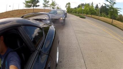 Speeding Toyota Supra saved from motorcycle cop by unaware driver
