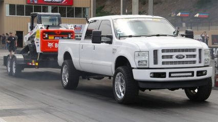 These guys drag race their trucks while towing heavy loads