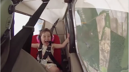 This kid reacting to doing stunts in dads plane is great