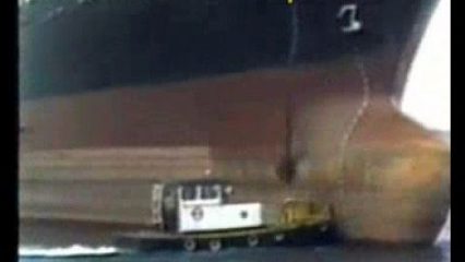 Man overboard, Ship drops huge anchor on a tug boat