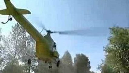 What was this pilot thinking? Low flying helicopter nails tree and is destroyed!