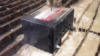 A Car Battery vs a 60,000 PSI Waterjet Cutter! Cutting Things In Half