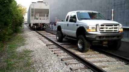 Ford Truck With 12V Cummins Towing a 98,000 Pound Rail Car
