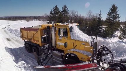 Busting Through a Giant Snow Bank in a 6×6 Western Star Snow Plow