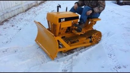Man Builds Miniature CAT Dozer to Clear His Driveway of Snow!